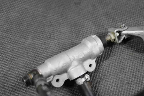 1997 HONDA CR250R OEM NISSIN REAR BACK BRAKE CALIPER MASTER CYLINDER LEVER