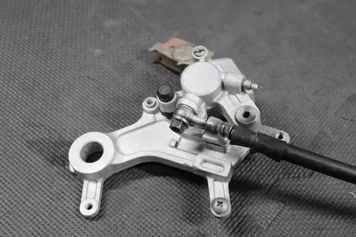 1997 HONDA CR250R OEM NISSIN REAR BACK BRAKE CALIPER MASTER CYLINDER LEVER