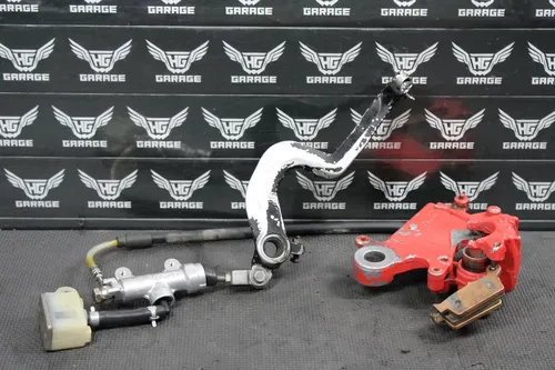 1997 SUZUKI RM250 OEM NISISN REAR BACK BRAKE CALIPER MASTER CYLINDER LEVER