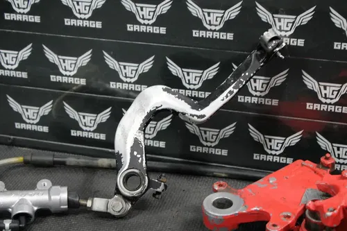 1997 SUZUKI RM250 OEM NISISN REAR BACK BRAKE CALIPER MASTER CYLINDER LEVER