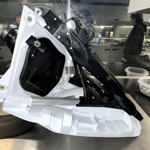 23 SX-f 250 Subframe, Air boot and mud flap