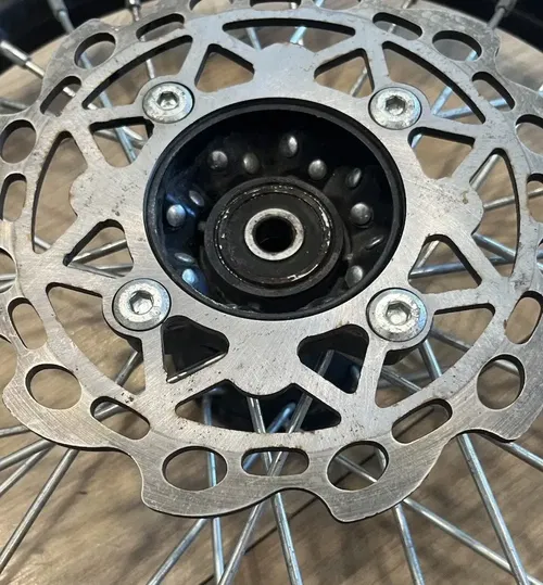 *** DENTED *** Front Wheel Assembly (14") For SSR SR125 Pit Bikes.