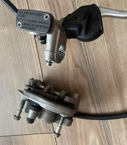 2019-24 HONDA CRF450R OEM FRONT BRAKE CALIPER ASSY.