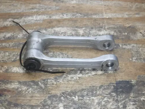 2004 RMZ250 (A) Suzuki Rear Shock Linkage Wish Bone Dog Spring Absorber