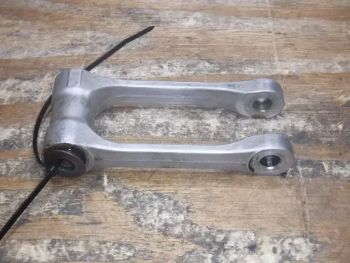 2004 RMZ250 (A) Suzuki Rear Shock Linkage Wish Bone Dog Spring Absorber