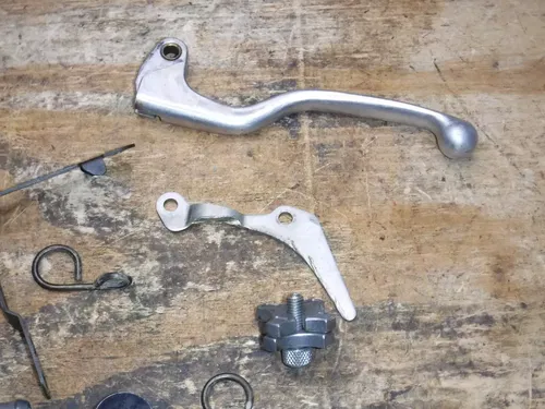 Kx250 MISC Parts Clutch Lever Case Saver Frame Brackets Hardware 2004 *