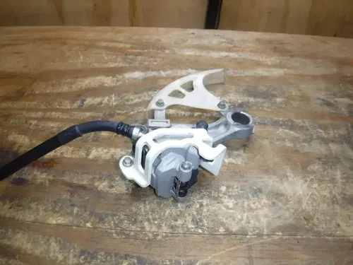 2010 RMZ250 Rear Brake Assembly Hose Line Caliper Master Cylinder