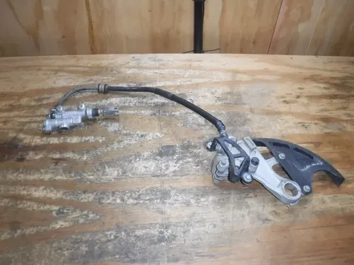 2012 CRF450 Honda Rear Brake Assembly MasterCylinder Brake Line Pads 05 - 2016
