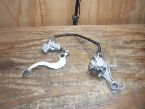 2012 RMZ450  Rear Brake Assembly Hose Line Caliper Mastercylinder Pipe