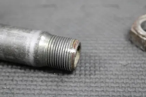 2001 HONDA CR250R OEM REAR AXLE BACK WHEEL RIM PIVOT BOLT AXEL 42301-KZ4-J40