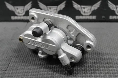 2007 KAWASAKI KX250F OEM NISSIN FRONT BRAKE CALIPER & HANGER BRACKET 43080-0006