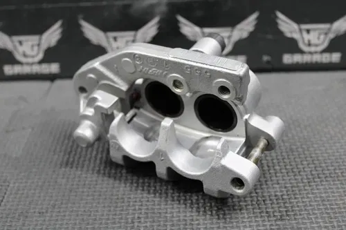 2007 KAWASAKI KX250F OEM NISSIN FRONT BRAKE CALIPER & HANGER BRACKET 43080-0006