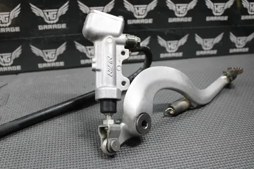 2006 05-07 KAWASAKI KX250 2 STROKE OEM REAR BRAKE CALIPER MASTER CYLINDER LEVER