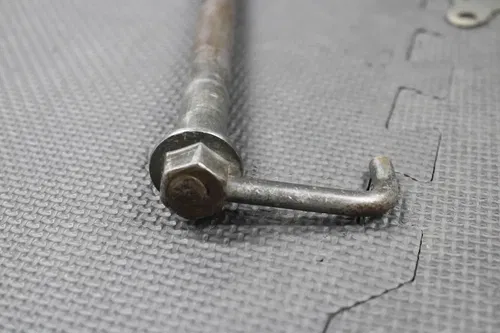 1996 HONDA XR250R XR400R XR600R OEM REAR AXLE BACK WHEEL RIM PIVOT BOLT SHAFT