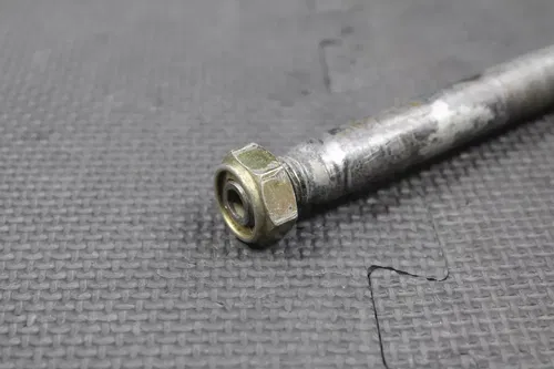 2002 HONDA CRF450R OEM REAR BACK SWINGARM BOLT SUSPENSION PIVOT 52101-KZ4-J40