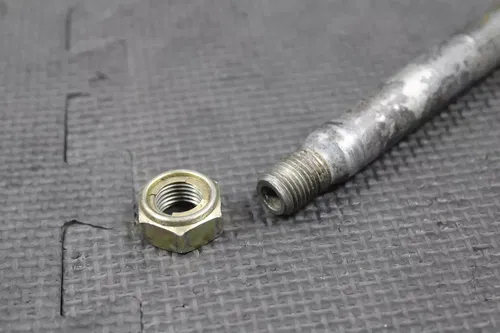 2002 HONDA CRF450R OEM REAR BACK SWINGARM BOLT SUSPENSION PIVOT 52101-KZ4-J40
