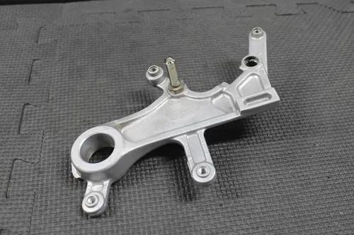 02-04 HONDA CR125R CR250R CRF450R OEM REAR BACK BRAKE CALIPER BRACKET HANGER