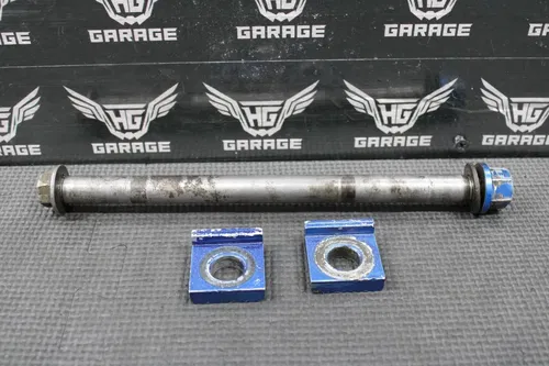2005 SUZUKI 04-23 RM85 OEM REAR AXLE BACK WHEEL AXLE BLOCKS NUT 64711-03B70