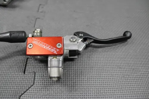 2006 KAWASAKI 04-07 KX125 KX250 OEM NISSIN FRONT BRAKE CALIPER MASTER CYLINDER