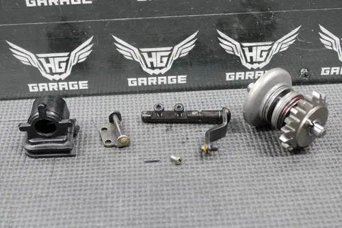 2003 KAWASAKI KX250 OEM EXHAUST POWER VALVE LINKAGE GOVERNOR SHAFT GEAR BOOT SET