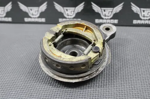 1985 KAWASAKI KX80 OEM REAR BACK BRAKE DRUM ASSEMBLY PADS ARM 41035-1400