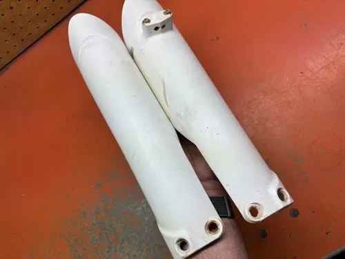 White OEM Genuine Fork Guards 7770109410028F 125-500  2016-2025