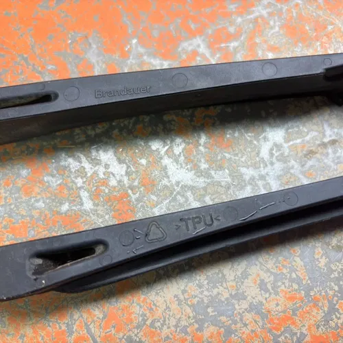 Swingarm Chain Slider Guide Guard 51504066000 150cc-500cc 2012-2023