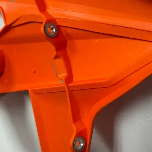 USED KTM LEFT SIDE TANK PLASTIC W/ NO GRAPHIC ORANGE 