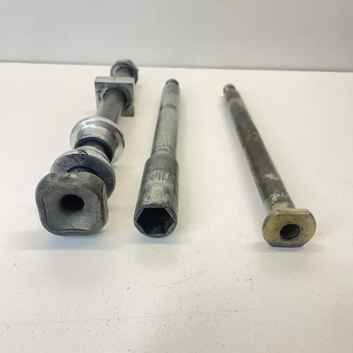 1997-1999 CR250R CR250 OEM Rear Wheel Axle Bolt Spindle Shaft Pivot Spacers Nut