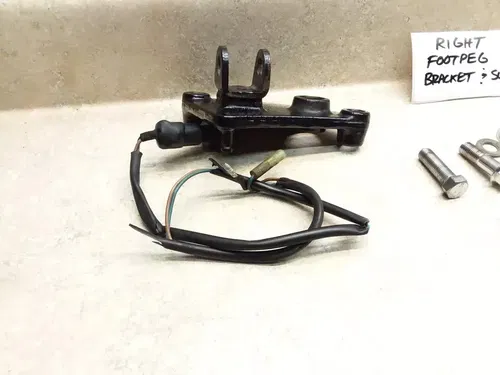 1988 Kawasaki VN 1500 Vulcan VN1500-A2 Right Foot Peg Bracket Brake Switch PJ-11