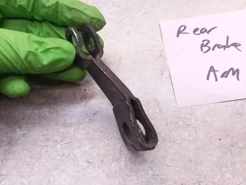 Honda 75 XR XR75 K2 Rear Brake Plate Arm DAMAGE OEM 1975 VTG ANX-B213