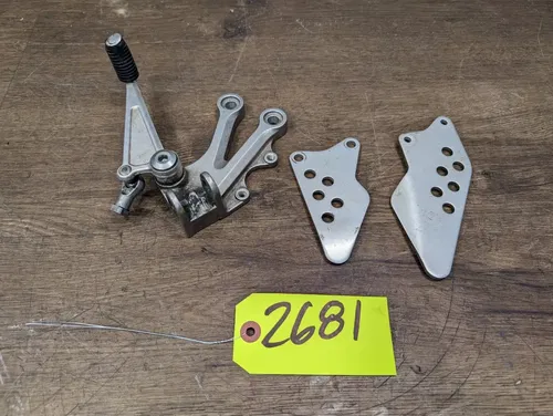 04-05 KAWASAKI NINJA ZX10R OEM LEFT REARSET REAR SET DRIVER FOOT REST SHIFTER