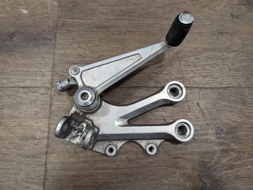04-05 KAWASAKI NINJA ZX10R OEM LEFT REARSET REAR SET DRIVER FOOT REST SHIFTER