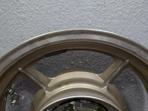 1995 YAMAHA VIRAGO 750 XV750 OEM LIGHT GOLD REAR WHEEL RIM - 42H-25338-01-P1