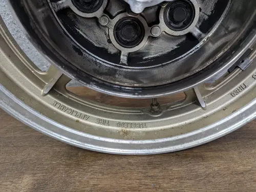 1995 YAMAHA VIRAGO 750 XV750 OEM LIGHT GOLD REAR WHEEL RIM - 42H-25338-01-P1