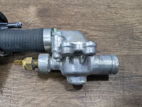 2008-2012 KAWASAKI NINJA EX250 OEM THERMOSTAT w/ HOUSING & CAP - 49054-1056