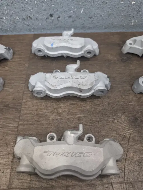 2005-2006 Kawasaki Ninja ZX6R ZX636 OEM Front Brake Caliper Lot - Unpainted