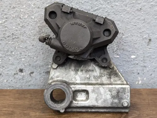 1996-2003 Kawasaki Ninja ZX7R OEM REAR BRAKE CALIPER & BRACKET - 43041-1591-DJ