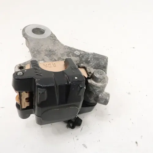 Kawasaki KLX250SF - Stock Rear Brake Caliper w/ Pads - 2009 KLX 250 OEM