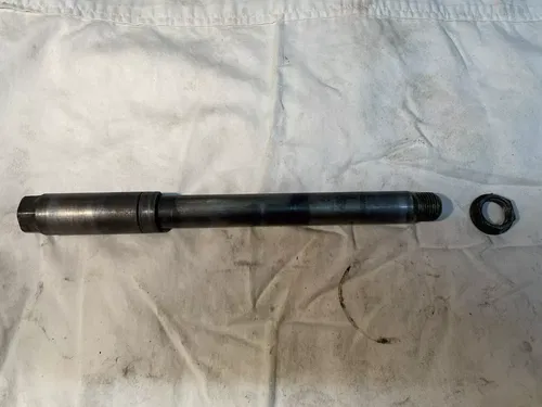 2000 Suzuki RM125 Front Axle and Nut Wheel RM 125