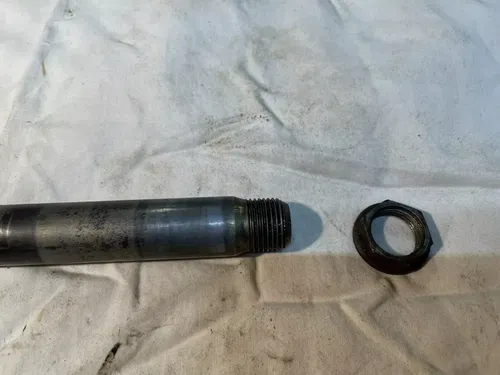 2000 Suzuki RM125 Front Axle and Nut Wheel RM 125