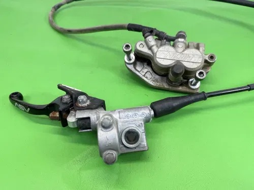 2011 09-17 KAWASAKI KX250F KX 250 F FRONT BRAKE ASSEMBLY COMPLETE ASV Snap Back