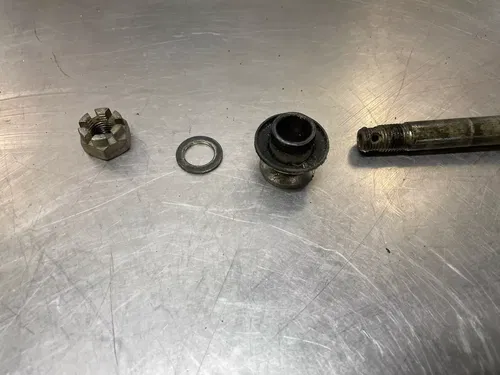 1989 Yamaha XT350 XT 350 Front wheel axle and spacer