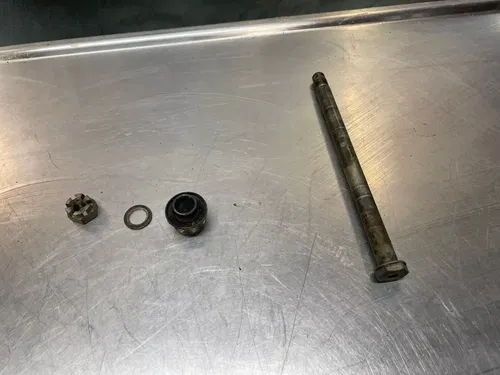 1989 Yamaha XT350 XT 350 Front wheel axle and spacer