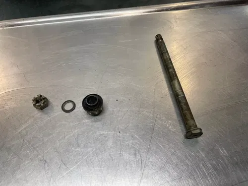 1989 Yamaha XT350 XT 350 Front wheel axle and spacer