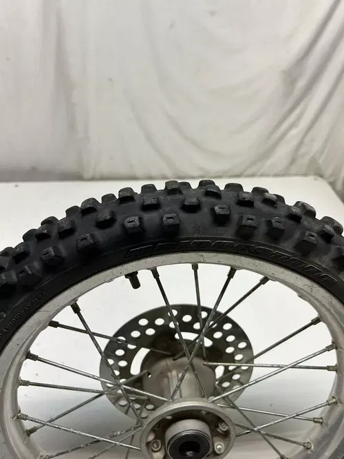2002 02 Kawasaki KX65 Kx 65 -A OEM WOBBLE! Front Wheel Rim Hub GOOD TIRE 14 In
