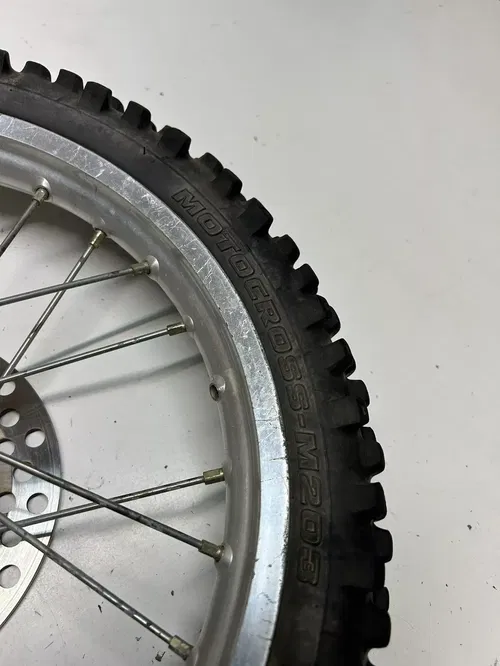 2002 02 Kawasaki KX65 Kx 65 -A OEM WOBBLE! Front Wheel Rim Hub GOOD TIRE 14 In