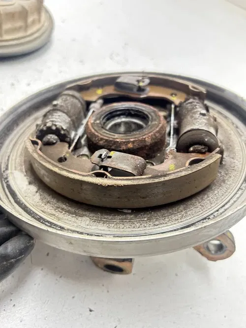 03 2003 Honda Foreman 450 TRX450FM OEM GOOD Front Right Hub Spindle Brake Plate