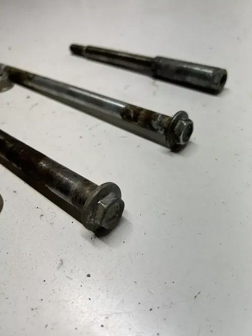 1984 84 Honda XL250R xl250r OEM LOT Front Rear Axle Shaft Swing Arm Bolt Adjust