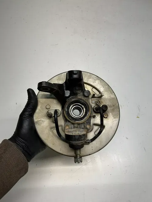 2002 02 Honda TRX500 FA2 4x4 Foreman Rubicon GOOD Left Hub Spindle Brake Plate